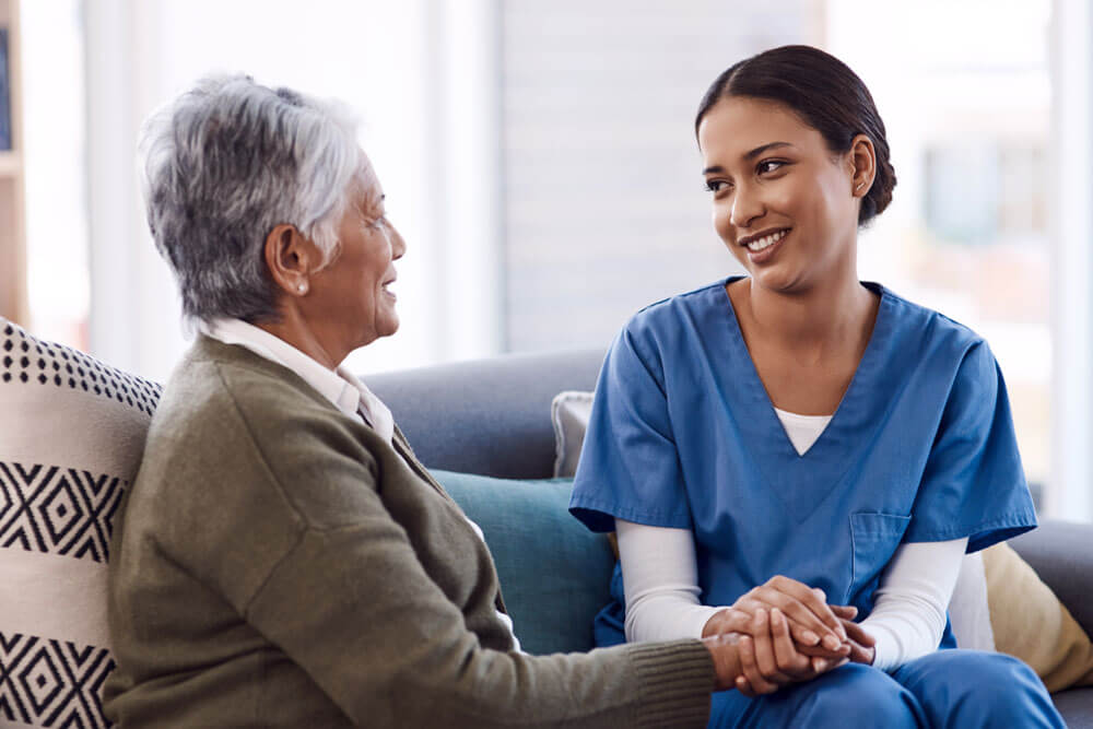 Professional caregiver with senior
